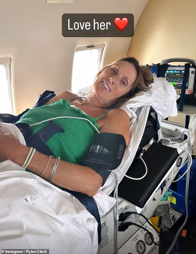 Cute: The host shared another photo of Linda as they boarded the plane on a stretcher attached to various medical devices, with the sweet message: 