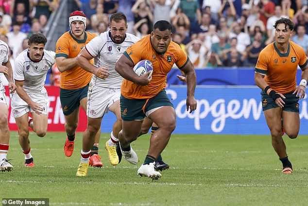 Prop Taniela Tupou (pictured running the ball) lived up to his 'Tongan Thor' nickname as he played a leading role in the Aussie pack's dominance up front