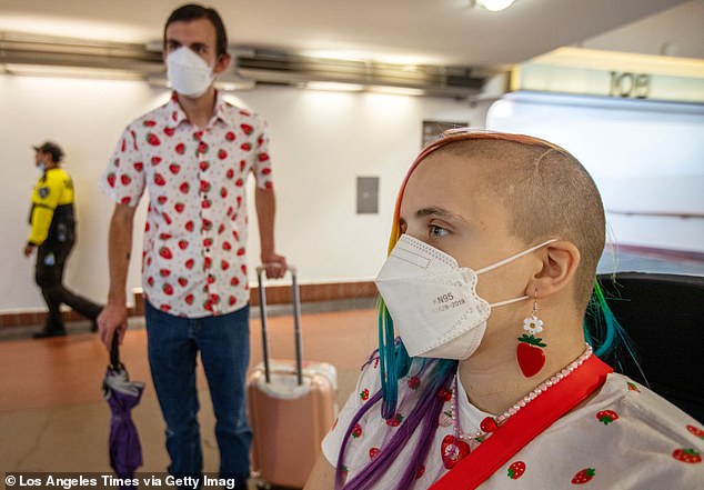 Los Angeles residents mask up at Union Station on August 31 as a rise in COVID cases prompts a return to pandemic habits in some areas