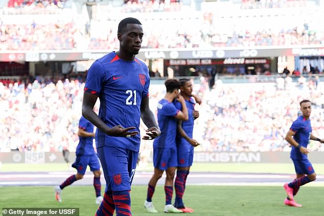 Weah, 23, celebrates his goal in the fourth minute of a match between Uzbekistan and the US