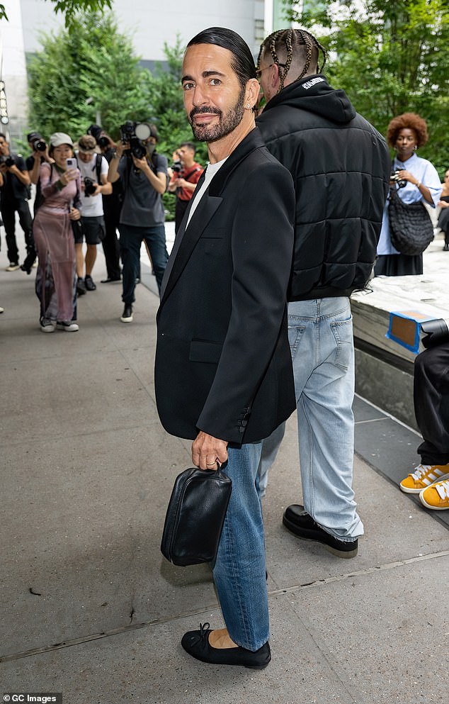 Fashion Designer: Designer Marc Jacobs also stopped by the Proenza Schouler show in a black blazer and white T-shirt with jeans.  He opted for the no-sock look in his black shoes