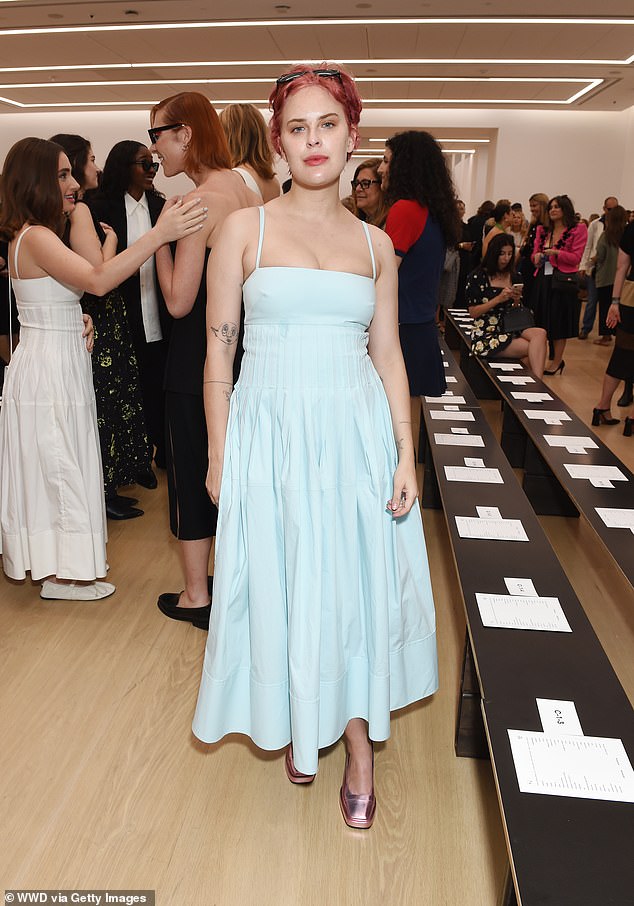 Rose gold: Tallulah Willis, 29, wore a beautiful light blue dress with a full skirt that fell to her ankles.  The bodice of the dress had spaghetti straps