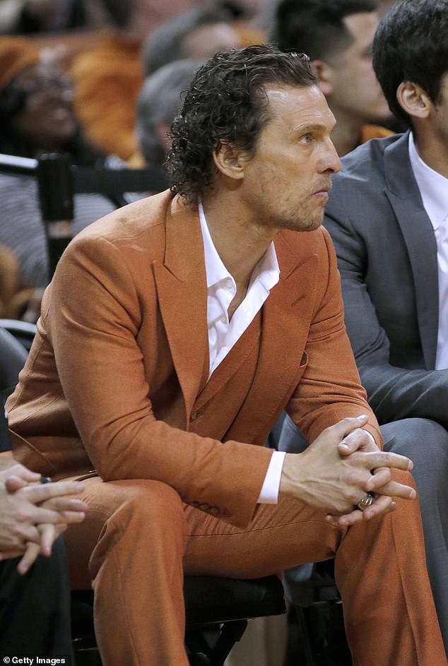 The Hollywood actor attends the school's football and basketball games in burnt orange