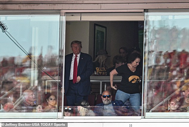 After being mobbed by fans on his way in, Trump headed to an exclusive box to enjoy the game at Jack Trice Stadium.