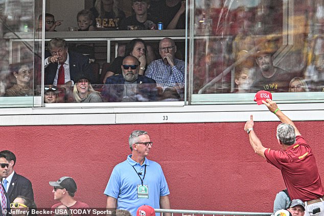 Trump sat in a glass box during the interstate confrontation, putting him in full view for thousands of attendees and allowing them to show both their support and their distaste for the former president