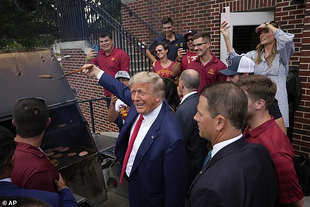 Before entering the stands at the Iowa Interstate Football game, Trump stopped by the Alpha Gamma Ro Agriculture Fraternity House at Iowa State University.