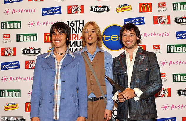 Pictured L-R: Ben Gillies, Daniel Johns and Chris Joannou of Silverchair in October 2001