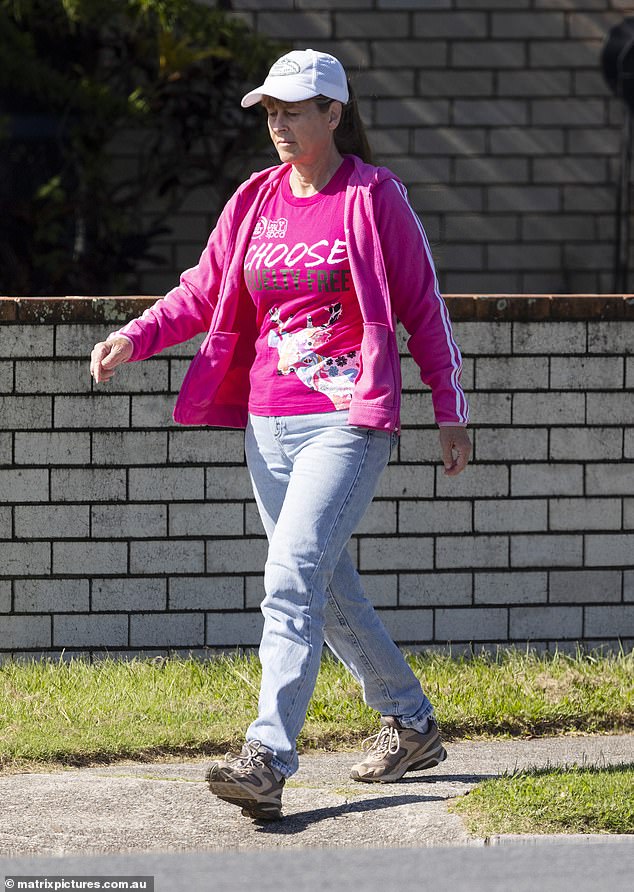 In March 2022, Terri channeled the '80s as she strolled along the Sunshine Coast in a bright pink T-shirt and matching hoodie