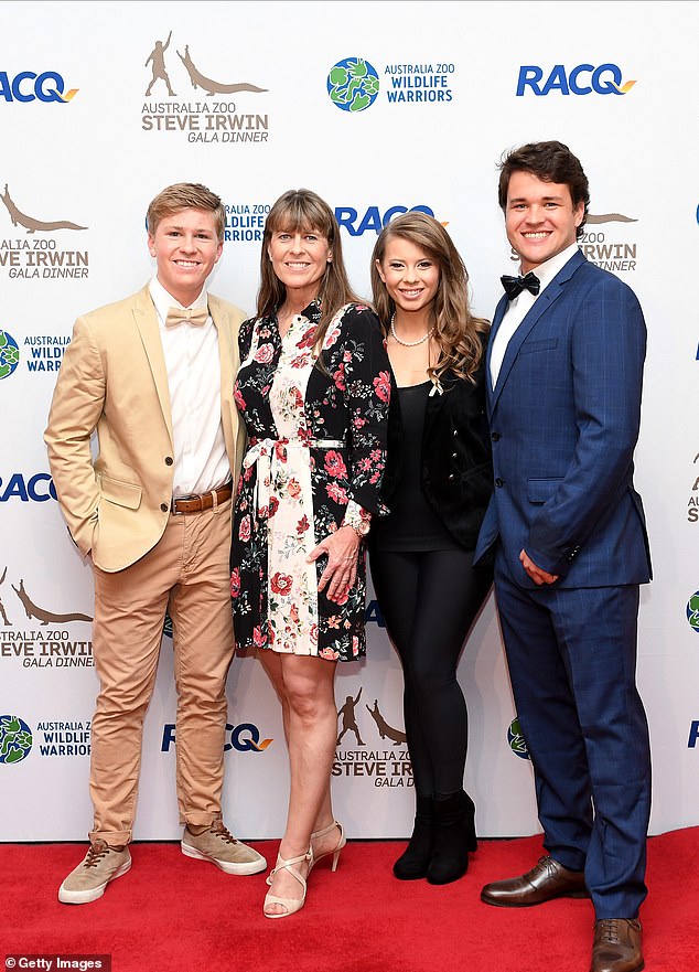 In November 2019, Terri graced the red carpet in yet another unusual ensemble while attending the annual Steve Irwin Gala Dinner in Brisbane.  Joined by her son Robert, daughter, Bindi and son-in-law Chandler Powell, Terri proved more is more as she strutted her stuff in a dramatic black and white shirt dress.