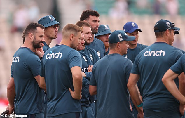 Flintoff is pictured at the back of the group as England prepare for their second ODI