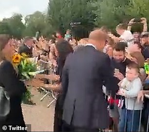 However, moments later a second member of staff approached her and appeared to tell her that they had to take them from her, and this time the Duchess handed over the flowers.