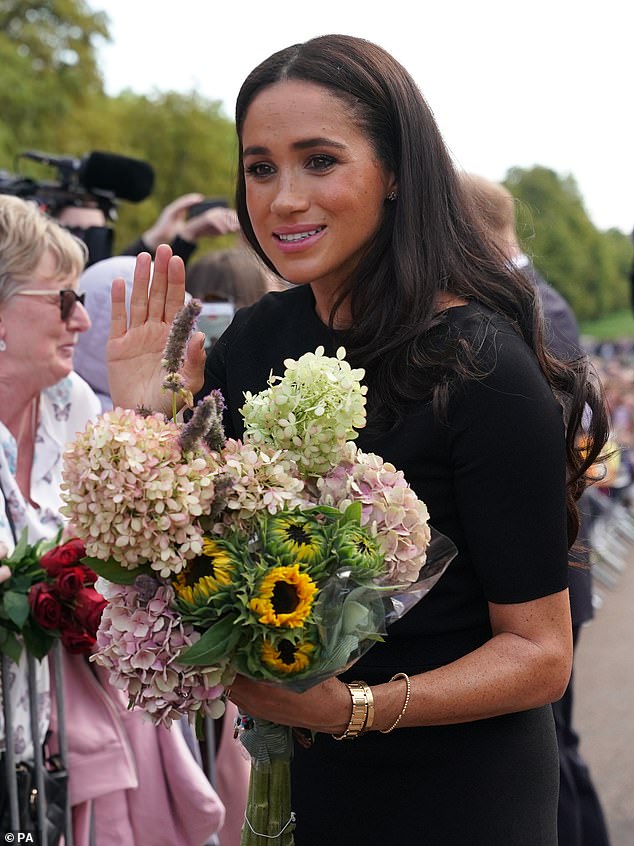 The Duchess of Sussex takes a walk to meet the public at Windsor Castle in Berkshire