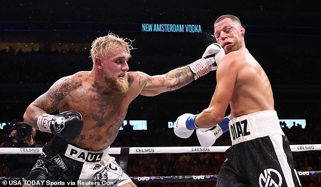 Drake also suffered a big loss last month after backing Nate Diaz (right) to defeat Jake Paul (left)