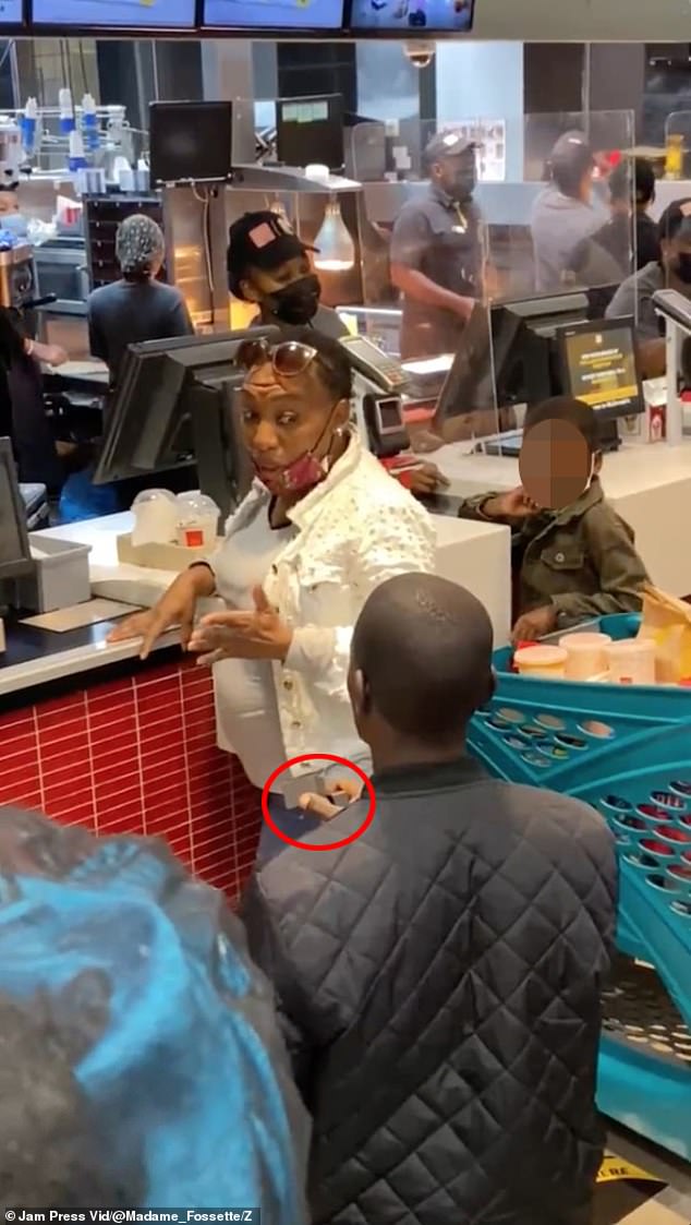 Footage shows the man on one knee holding up a ring box as the woman orders at the cash register of the fast food chain's Sandton branch in Johannesburg, South Africa