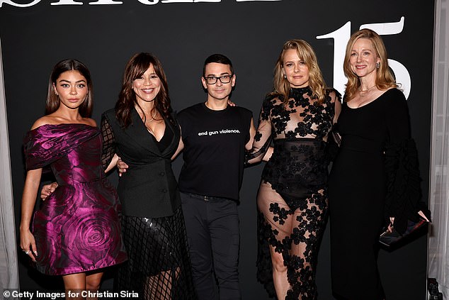 Designer Christian Siriano during his show along with celebrity fans Sarah Hyland, Rosie Perez, Alicia Silverstone and Laura Linney