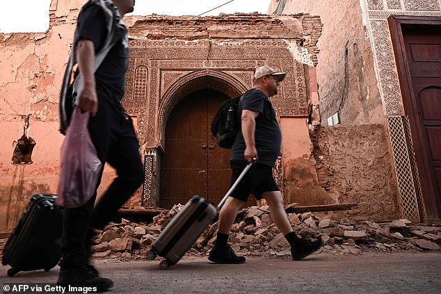 Thousands of holidaymakers were seen leaving the affected country