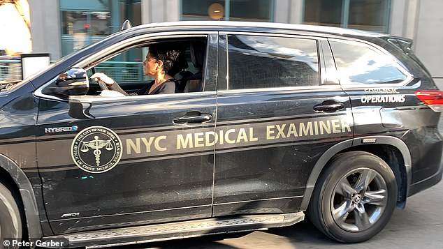 A medical examiner is seen outside the Williamsburg, Brooklyn apartment complex.  She had trauma to her arm.  The medical examiner is now investigating the cause of death