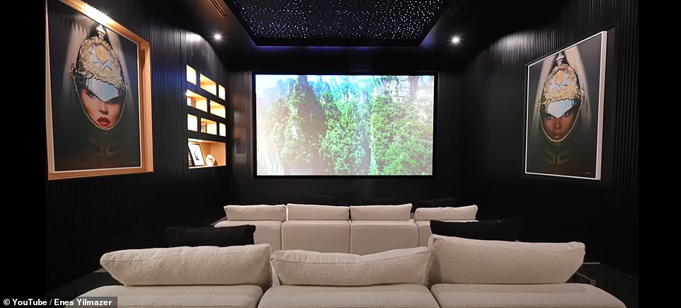 There is a three-row cinema decorated with a twinkling starlight ceiling