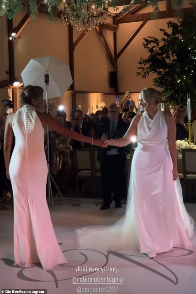 The two radiant brides were married in their backyard in Connecticut, with Roberts' children's pastor officiating the ceremony