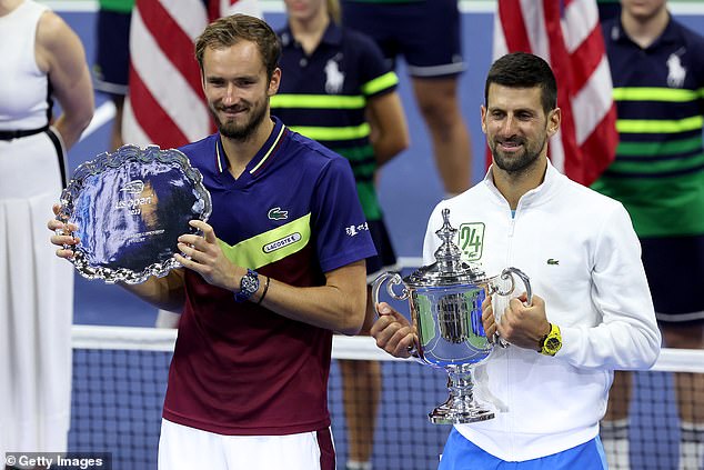 Djokovic (R) is now tied with Australian legend Margaret Court for the all-time Majors record