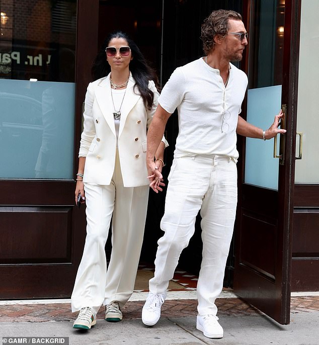 Affectionate: The two lovebirds – who first crossed paths at a West Hollywood nightclub in 2006 – were spotted making their way down a busy sidewalk while lovingly holding hands