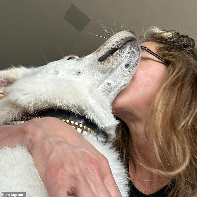 Puppy love: Jennifer also enjoyed some quality time with her two pups: Lord Chesterfield and Clyde