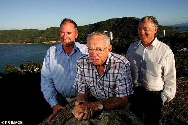 The island is currently owned by the billionaire Oatley family (pictured, Bob Oatley, who died seven years ago, with sons Sandy and Ian)