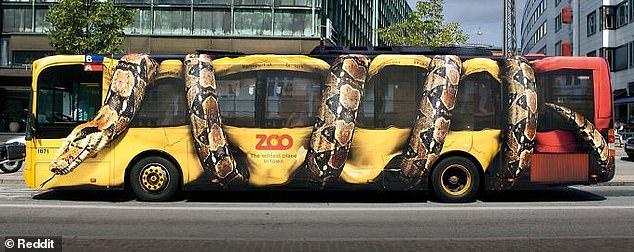 This bus features an optical illusion advertisement for the Copenhagen Zoo, as it appears as if a snake has wrapped its body around the vehicle.