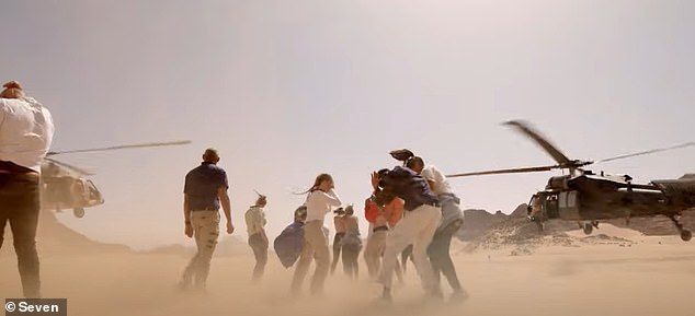 The trailer begins by dropping the celebrity contestants into a sandy desert, which according to the subtitles is in a 