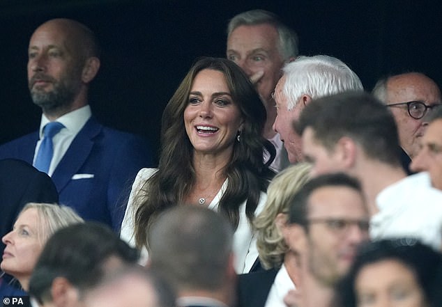 Kate has been hailed as a 'queen in waiting' pictured at this week's Rugby World Cup