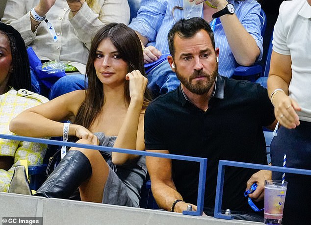 Wow: The model, 32, settled in next to Justin, 52, at the USTA Billie Jean King National Tennis Center as they watched Novak Djokovic win his record 24th Grand Slam title