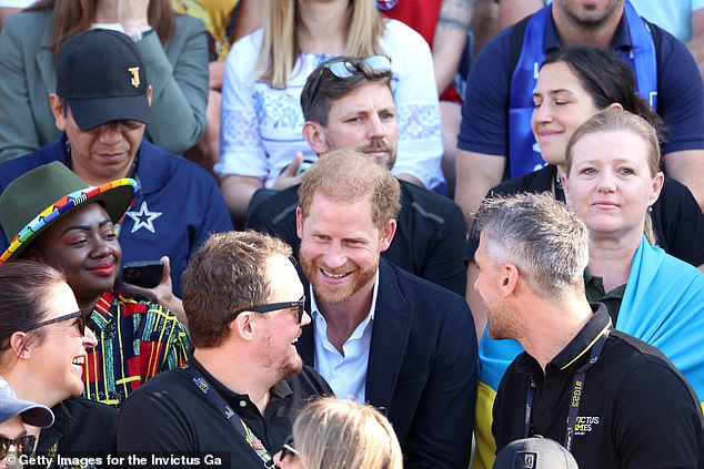 The Duke of Sussex, 38, appeared at the Invictus Games in Dusseldorf today as he watched from the stands of the Merkur Spiel-Aren