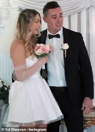 Stunned: The singer-songwriter made a surprise appearance at Las Vegas' legendary Little White Chapel - where a young couple was exchanging vows