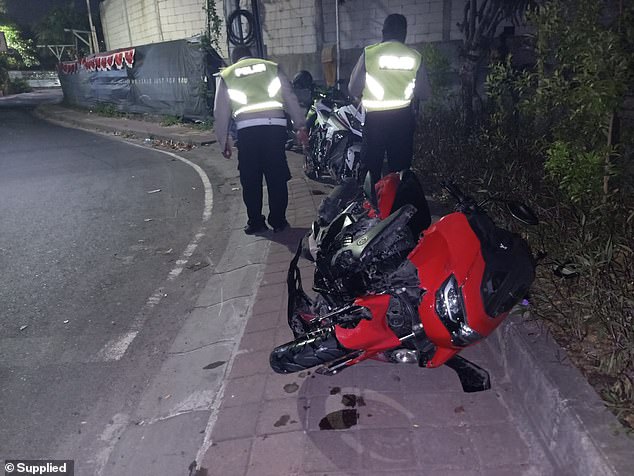 In photos taken in the aftermath of the crash, Mr Ward's 155cc Yamaha NMax motorcycle lies crumpled on the side of the road.