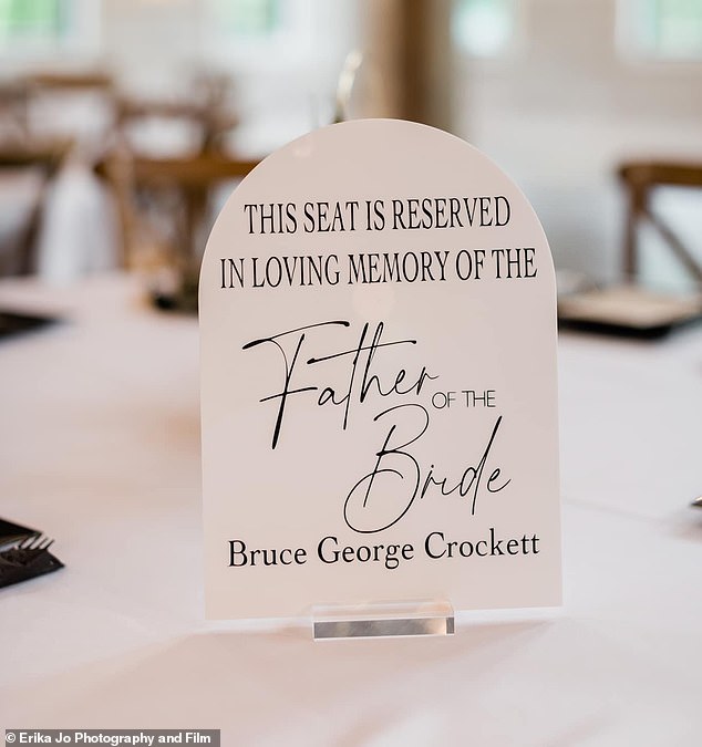 Natalie wore the locket her father gave her, had a white balloon, a photo slideshow at the wedding reception and a symbolic place card for the bride's father at the table (pictured)