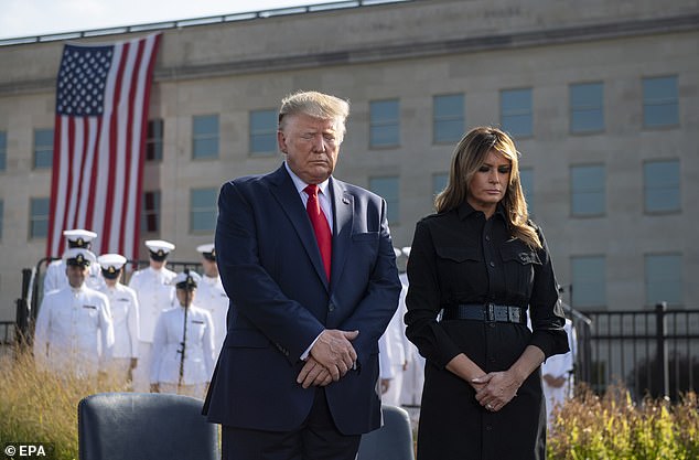 Then-President Donald Trump and First Lady Melania Trump participate in a ceremony at the Pentagon during the 18th anniversary of the September 11, 2019, attacks