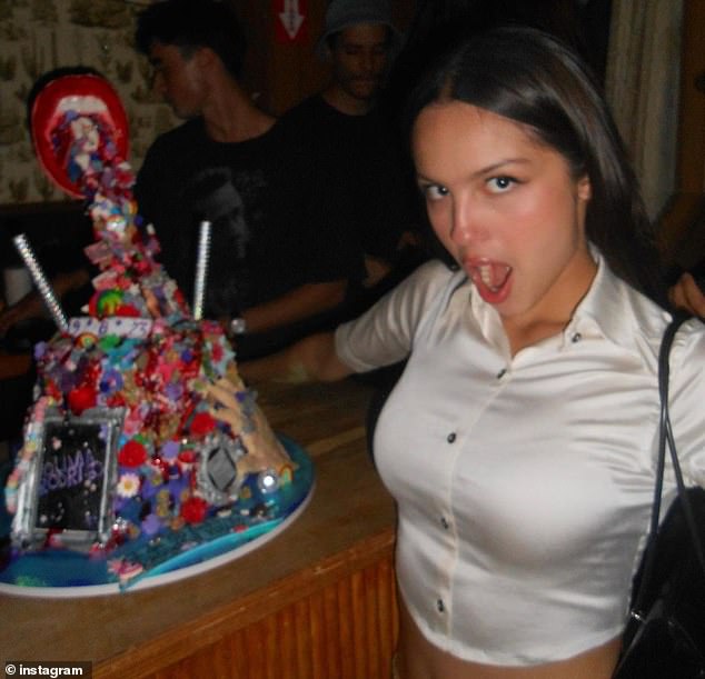 Gutsy girl: The vampire singer shared a cake made in honor of her second album, Guts