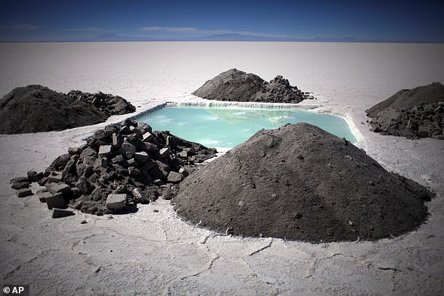 Most of the world's lithium reserves are locked up in brine.  Recovering lithium brine involves drilling into the underground brine deposit, which is then pumped to the surface and distributed to evaporation ponds such as this one in Bolivia