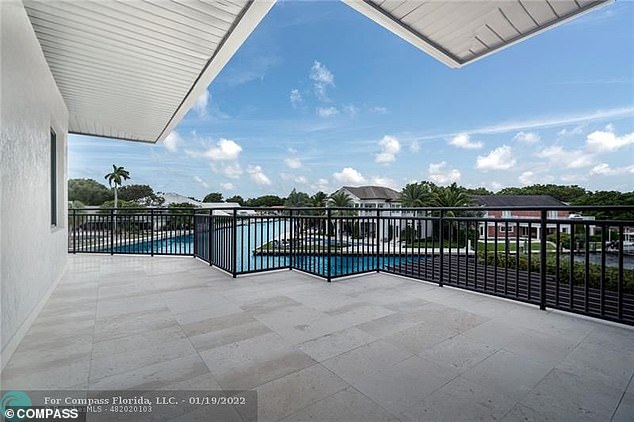 The $10.75 million property features a balcony that overlooks the Fort Lauderdale skyline