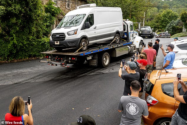 2020 Ford Transit van investigators believe fugitive Danelo Cavalcante stable will be towed away Sunday