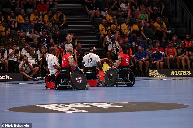 Team USA and Team UK battle for the gold medal in the wheelchair rugby finals at the Invictus Games in Dusseldorf