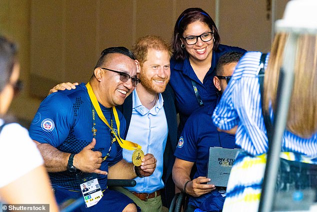 The Duke of Sussex meets competitors as he attends the athletics event