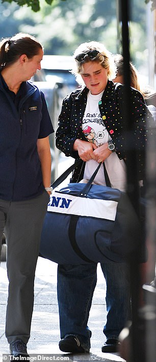 Maisy, 22, carried a blue PENN bag