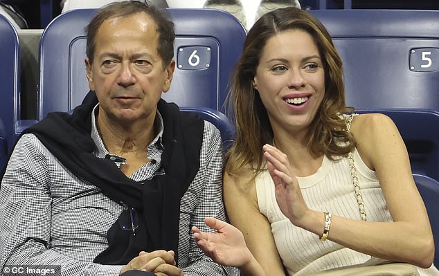 John Paulson with new girlfriend Alina de Almeida, 34, got close at the US Open in September