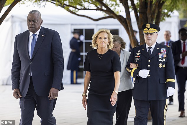 Jill Biden with Defense Secretary Lloyd Austin (left) and Chairman of the Joint Chiefs of Staff Mark Milley (right)