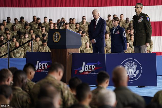 President Joe Biden marked Sept. 11 in Alaska with Maj. Gen. Brian Eifler, commanding general of the 11th Airborne Division, right, and Chief Master Sgt.  Amy Miller, U.S. Air Force, Joint Base Elmendorf-Richardson