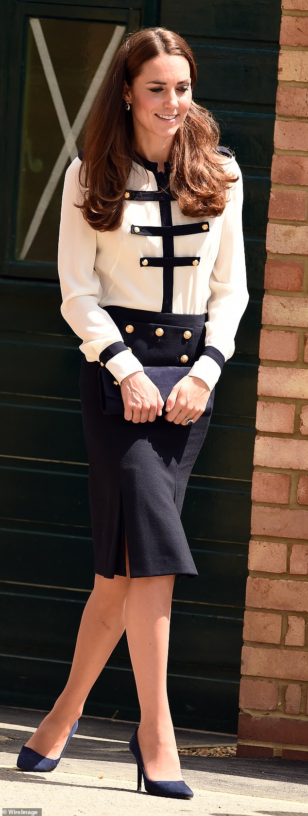 During an official visit to Bletchley Park in June 2014, the princess opted for a white and navy blue McQueen dress with military-style detailing.