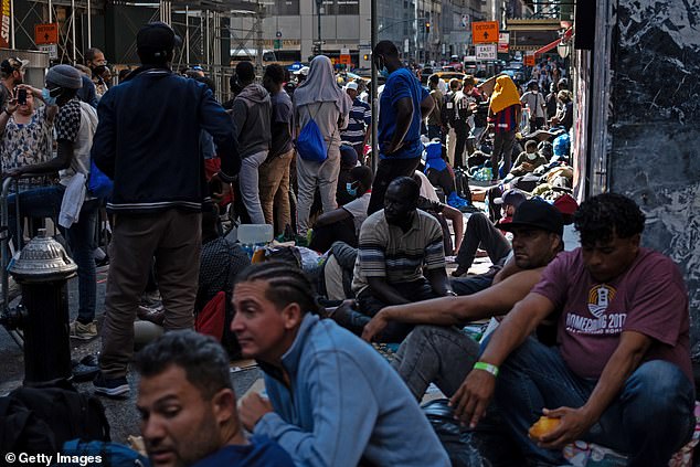 It's the same story in Manhattan.  Fancy hotels are now closed to public use and have been transformed into towering temples of failure.  Outside the Roosevelt Hotel (pictured), across from Grand Central Station, dozens of men line the sidewalk, sleeping on cardboard and under sleeping bags.  Even this establishment with a thousand rooms cannot stop the influx.