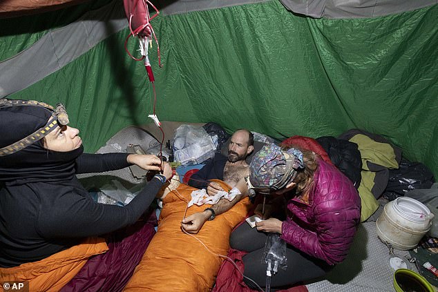 A medical team cares for American caver Mark Dickey, mid-40s, in Morca Cave near Anamur, southern Turkey.