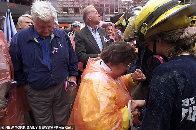 Biden (center) visits Ground Zero on September 20, 2001 with fellow senators Ted Kennedy (left) and Barbara Mikulski (center, in poncho)